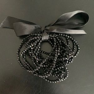 Black beaded bracelets with ribbon